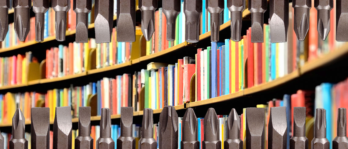 resources-slider A curving library bookshelf with colorful books behind a horizontal trim of drill bits at the top and bottom of the frame
