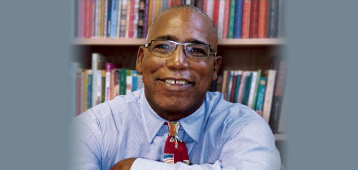 Photo of Maurice Sykes in front of a bookshelf, a detail of his book cover: "Doing the Right Thing for Children"
