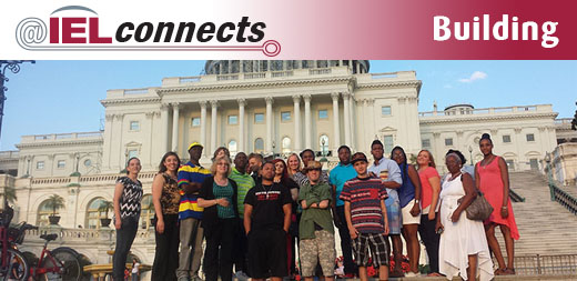 A group of youth and mentors from IEL's career-focused Ready to Achieve Mentoring Program for youth with disabilities stands on the steps of the U.S. Capitol.