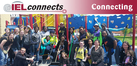 Baltimore Community Schools Awards for Excellence winners pose in front of a newly refurbished school playground.