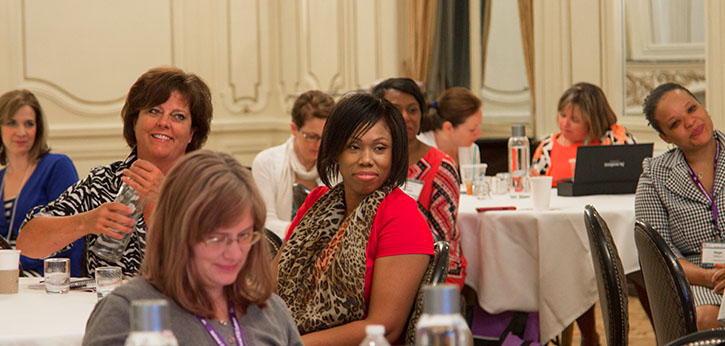 A group of AERA/IEL policy luncheon participants listen to the keynote speaker.