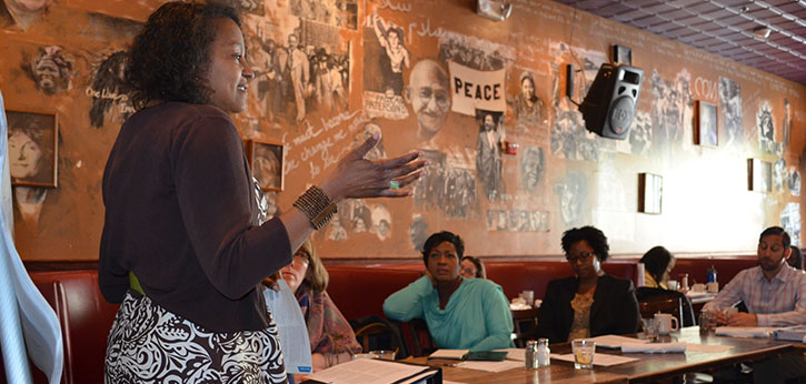 DC Youth Workforce Leaders Academy facilitator Patricia D. Gill discusses employer engagement strategies; several youth service professionals participate in the background.