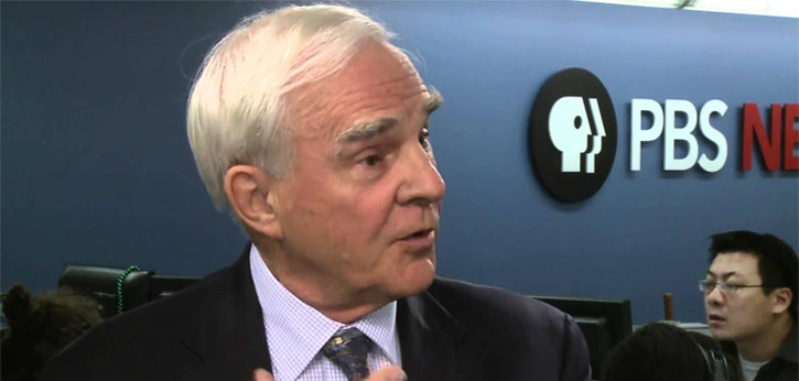 Image of John Merrow on the set of PBS News Hour.