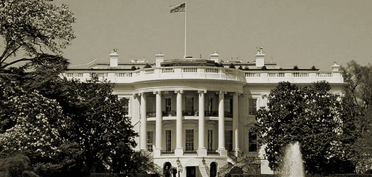 Black and white photo of the White House's southern facade.
