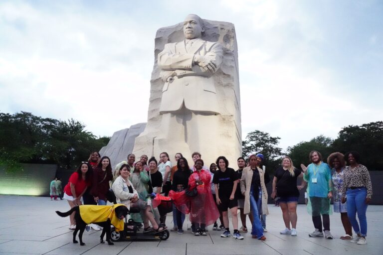 RAMP youth and adults pose in front of the MLK Memorial